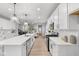 Well-equipped kitchen with an island, stainless steel appliances, and lots of counter space at 1713 Real St, Indianapolis, IN 46240