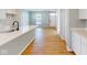 Beautiful kitchen island with stainless steel appliances and hardwood flooring at 1713 Real St, Indianapolis, IN 46240