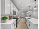Stylish kitchen with stainless steel appliances, quartz countertops, and modern finishes at 1713 Real St, Indianapolis, IN 46240