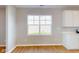 Bright kitchen with white cabinets, modern appliances, and ample counter space at 1713 Real St, Indianapolis, IN 46240