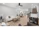 Spacious living room with an open floor plan, neutral decor, and hardwood floors creating a welcoming atmosphere at 1713 Real St, Indianapolis, IN 46240