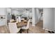 Open concept living and dining area with modern decor and finishes, providing ample space for entertaining at 1713 Real St, Indianapolis, IN 46240
