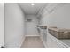 Walk-in closet with carpet, white wire shelving, and neutral walls at 1713 Real St, Indianapolis, IN 46240