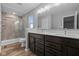 Bathroom showcases a double sink vanity and glass shower at 1717 Real St, Indianapolis, IN 46240