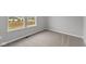 Bedroom with plush carpeting and bright window overlooking the construction site at 1717 Real St, Indianapolis, IN 46240