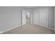 Carpeted bedroom featuring neutral walls and closet at 1717 Real St, Indianapolis, IN 46240