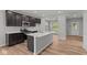Modern kitchen with stainless steel appliances and a spacious island at 1717 Real St, Indianapolis, IN 46240