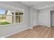Comfortable bonus room with wood-look flooring, large window, and access to a full-sized closet at 1717 Real St, Indianapolis, IN 46240