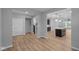 Bright living room area with hardwood flooring leading to kitchen at 1717 Real St, Indianapolis, IN 46240