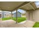 Covered patio with view of the backyard and detached garage at 1717 Real St, Indianapolis, IN 46240