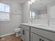 Bathroom features a double sink vanity with quartz countertops and modern fixtures at 1721 Real St, Indianapolis, IN 46240