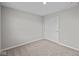 Bedroom features neutral carpet and a closet at 1721 Real St, Indianapolis, IN 46240