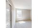 Bedroom with carpet, a neutral-colored wall and a large window providing natural light at 1721 Real St, Indianapolis, IN 46240