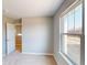 Bedroom with carpet, a neutral-colored wall and a large window providing natural light at 1721 Real St, Indianapolis, IN 46240