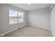 Bedroom features a view through the window and a closet at 1721 Real St, Indianapolis, IN 46240