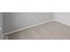 A gray bedroom featuring carpet flooring and white trim at 1721 Real St, Indianapolis, IN 46240