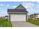 Two car garage with driveway at 1721 Real St, Indianapolis, IN 46240