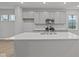 Modern kitchen features an island, stainless steel appliances, and stunning countertop at 1721 Real St, Indianapolis, IN 46240