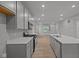 Modern kitchen features an island, stainless steel appliances, and stunning countertop at 1721 Real St, Indianapolis, IN 46240
