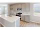 Chic kitchen featuring an island, stainless steel appliances, and ample counter space at 1721 Real St, Indianapolis, IN 46240