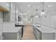 Modern kitchen with stainless steel appliances, subway tile backsplash, and an island with pendant lighting at 1721 Real St, Indianapolis, IN 46240