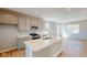 Modern kitchen featuring an island, stainless steel appliances, and sleek countertops at 1721 Real St, Indianapolis, IN 46240