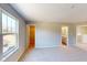 Spacious main bedroom with natural light, a walk-in closet, and an en-suite bathroom at 1721 Real St, Indianapolis, IN 46240