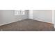 Spacious bedroom with carpeted floors and large window at 2634 Country Estates Dr # 17, Indianapolis, IN 46227