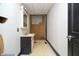 Bathroom with vanity and mirror; undergoing renovation at 3324 Prospect St, Indianapolis, IN 46203