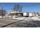 Commercial building with parking lot and snow-covered ground at 3324 Prospect St, Indianapolis, IN 46203