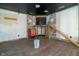 Unfinished interior with stone wall and exposed beams at 3324 Prospect St, Indianapolis, IN 46203