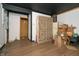 Renovation project: room with hardwood floors and exposed walls at 3324 Prospect St, Indianapolis, IN 46203