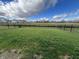 Fenced backyard with grassy area at 3406 Preakness St, Whitestown, IN 46075