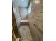 Walk-in shower with hexagonal floor tiles and built-in seat at 3406 Preakness St, Whitestown, IN 46075