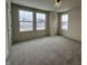 Bright bedroom with neutral walls and carpet at 3406 Preakness St, Whitestown, IN 46075