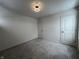 Simple bedroom with neutral walls and carpet at 3406 Preakness St, Whitestown, IN 46075