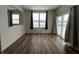 Bright dining room with hardwood floors and access to backyard at 3406 Preakness St, Whitestown, IN 46075