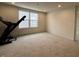 Spacious exercise room with carpeted floor and large window at 3406 Preakness St, Whitestown, IN 46075
