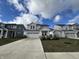 Two-story house with gray siding, white trim, and a two-car garage at 3406 Preakness St, Whitestown, IN 46075