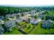 Neighborhood aerial view highlighting the manicured lawns and fenced backyards at 3460 Limelight Ln, Whitestown, IN 46075