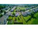 A high altitude shows the property's fenced backyard and tranquil neighborhood location at 3460 Limelight Ln, Whitestown, IN 46075