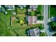 Overhead view of a house featuring a fenced backyard, patio and lush green lawns at 3460 Limelight Ln, Whitestown, IN 46075