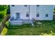 Enjoy outdoor living on this home's back deck with sliding glass doors and landscaped garden at 3460 Limelight Ln, Whitestown, IN 46075