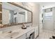 Double vanity bathroom with a large mirror and plenty of storage at 3460 Limelight Ln, Whitestown, IN 46075