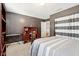 Serene bedroom with a desk setup, built-in shelves, and a double bed at 3460 Limelight Ln, Whitestown, IN 46075