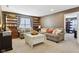 Spacious Gathering room with ample seating and built-in shelving at 3460 Limelight Ln, Whitestown, IN 46075