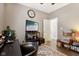 Home office features built-in shelving, a large desk, and comfortable seating at 3460 Limelight Ln, Whitestown, IN 46075