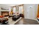 Living room features a neutral palette, hardwood floors, and decorative fireplace at 3460 Limelight Ln, Whitestown, IN 46075