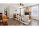 Living room with fireplace, comfortable seating, and hardwood floors at 3460 Limelight Ln, Whitestown, IN 46075
