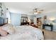 Spacious main bedroom with large bed, sitting area, and ensuite bathroom at 3460 Limelight Ln, Whitestown, IN 46075